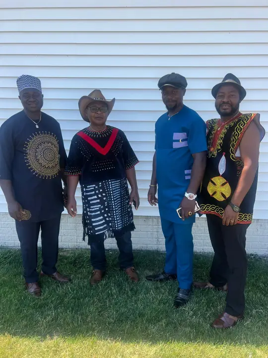 Four CAVFC members in traditional attire